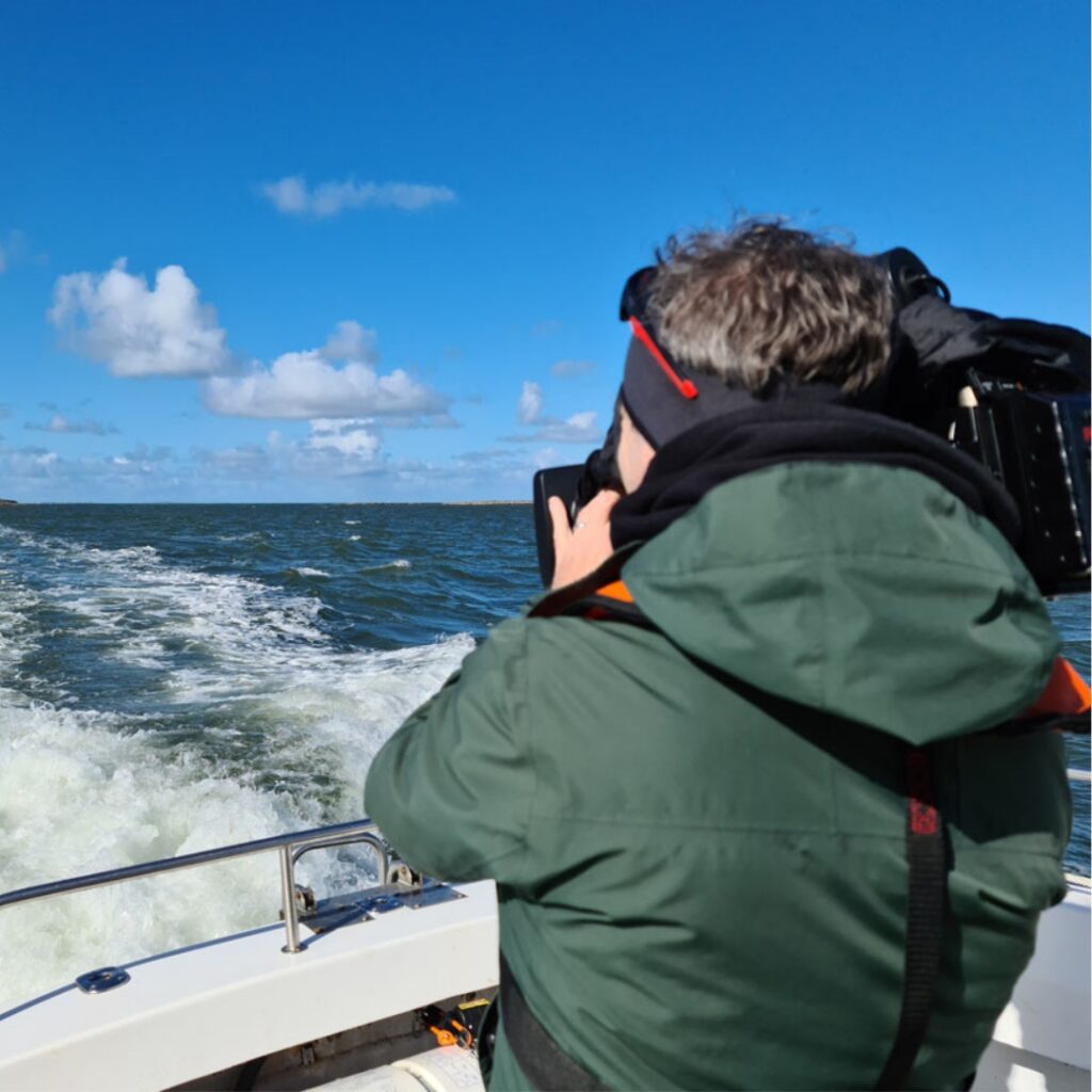 camera man on boat