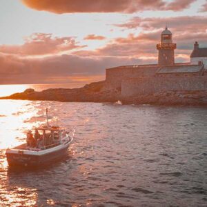 Fenit Lighthouse & Boat at Sunset