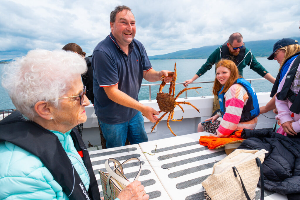 man holding a crab